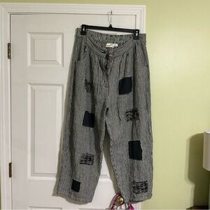 A RareBird Striped Black and White Patched pants size XL.